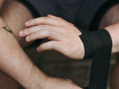 Close up of athlete's hands preparing for a pullup